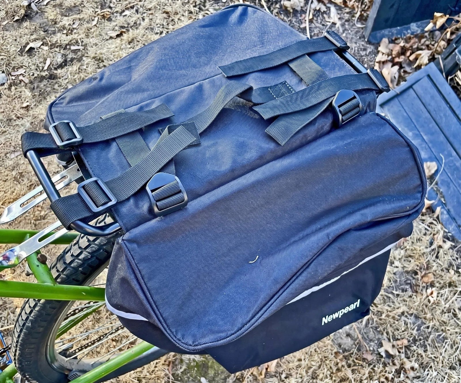 Reflective water resistant bicycle bags with heel clearance design