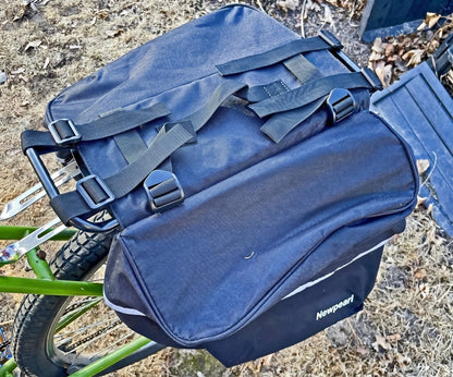 Reflective water resistant bicycle bags with heel clearance design