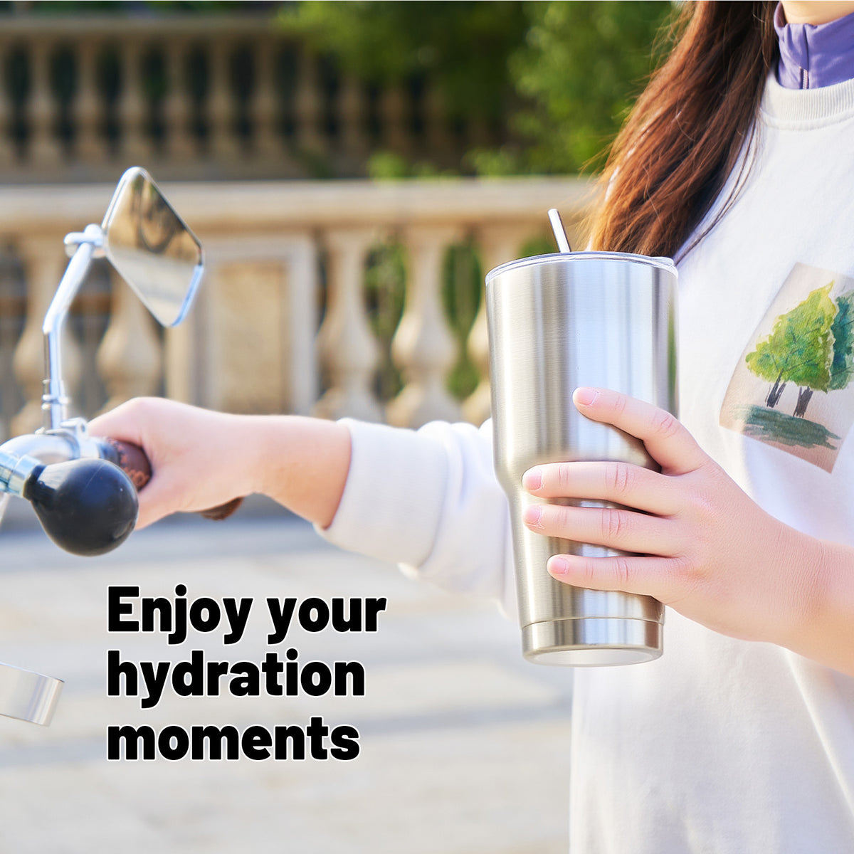 Silver 30 oz travel tumbler with double-wall insulation