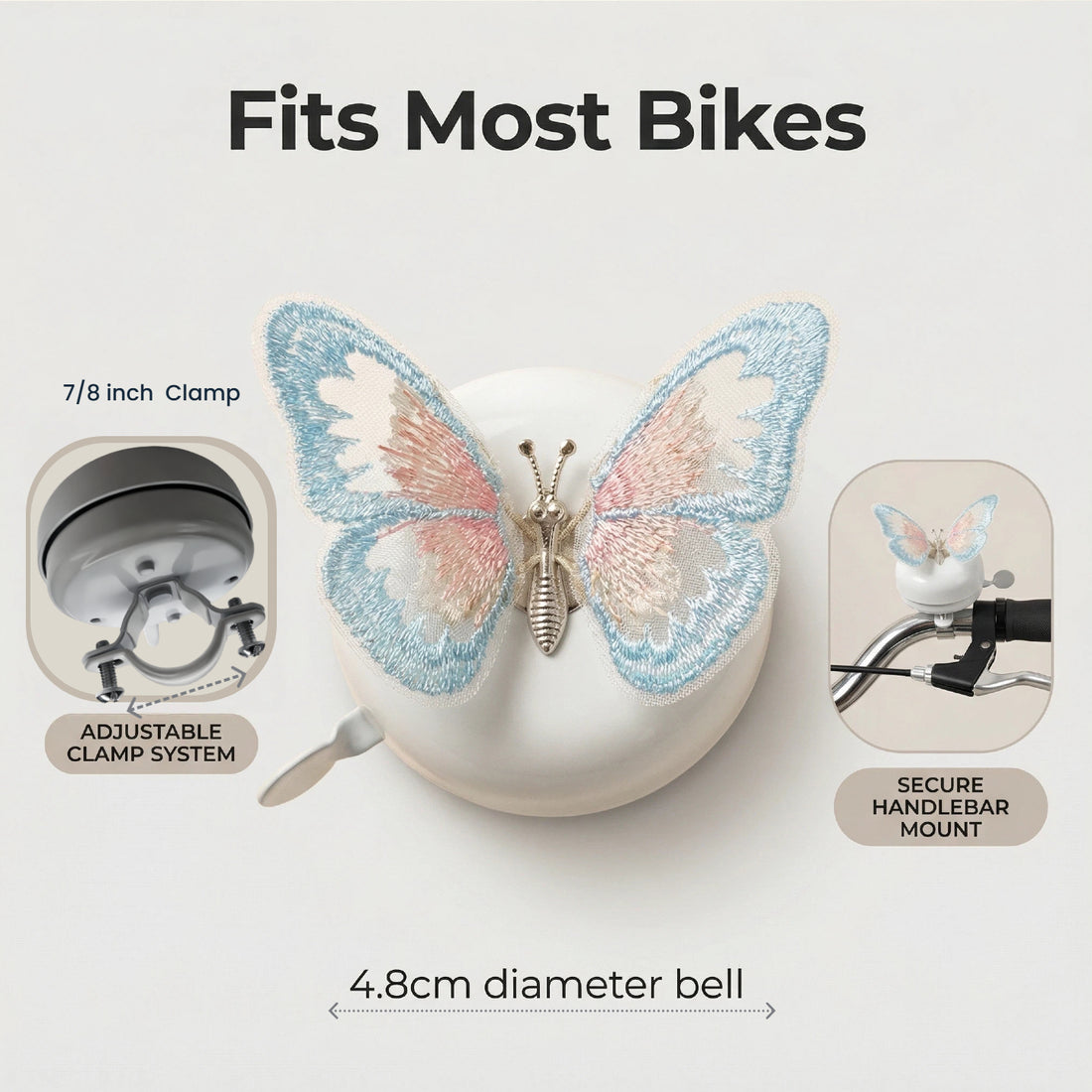 Classic white bike bell with decorative butterfly accent